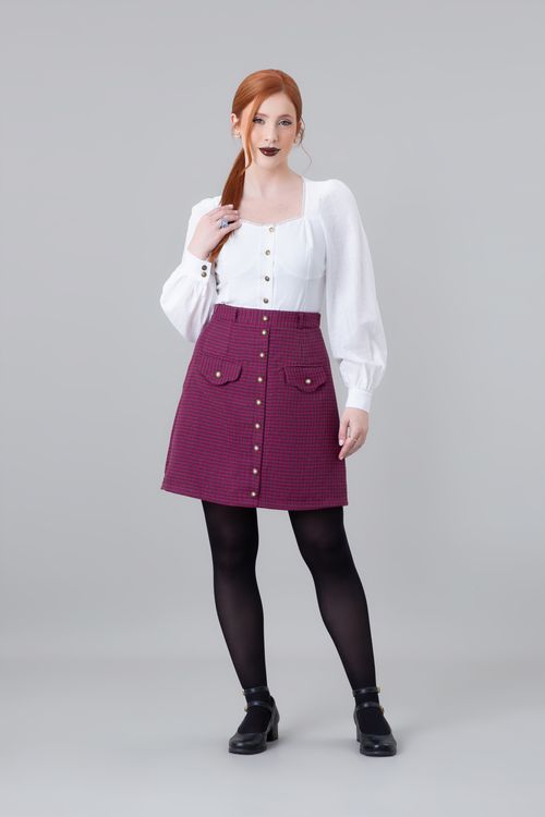 1-short-saia-petit-chanel-xadrez-poirot-magenta-black.jpg